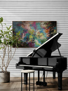 room with grand piano and large plant